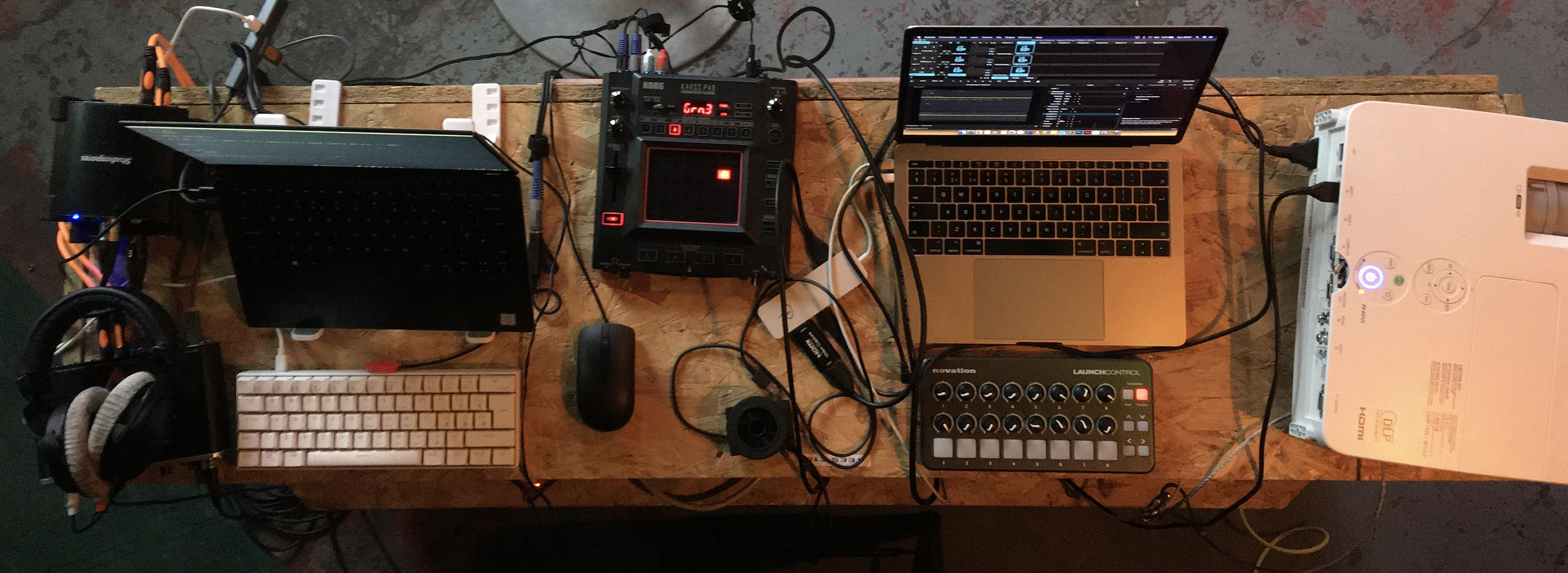 a top down photo of our laptops and equipment during performance